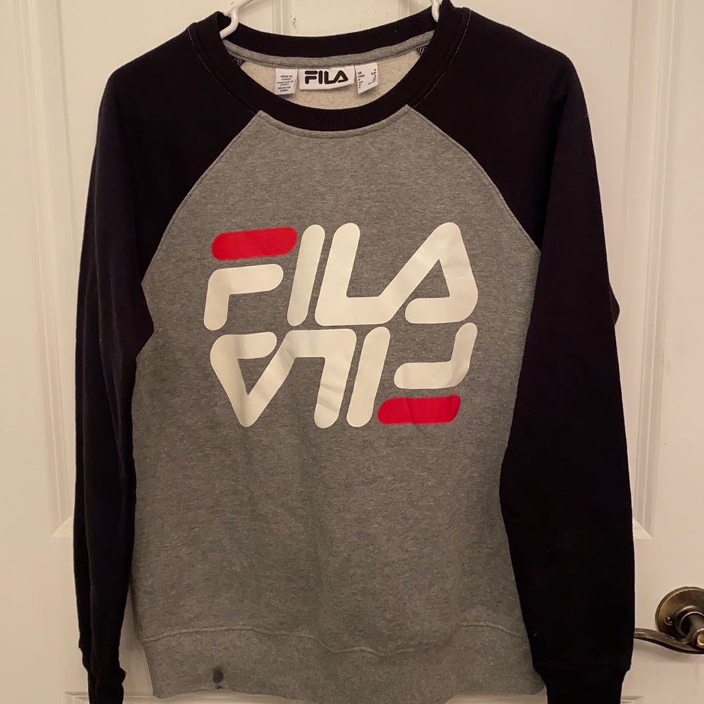 Crewneck Fila sweater in a size Small.
